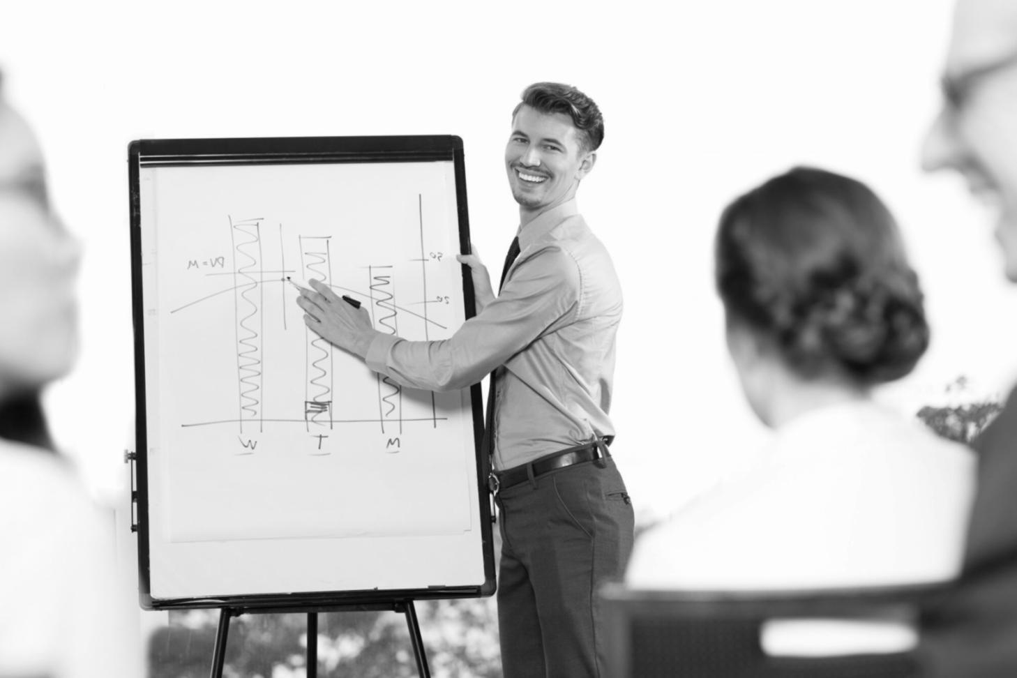 Business team analyzing financial forecasting data and charts